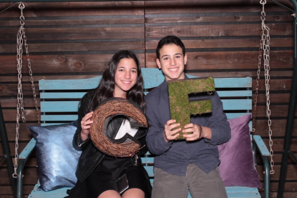 a classy photo booth photo of two teenage guests at a Los Angeles bat mitzvah
