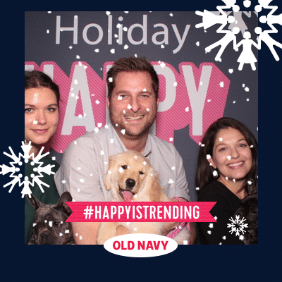 A GIF with animated snow overlay at an Old Navy branding Holiday Party at The Pacific Design Center in Los Angeles with puppies used as photo props