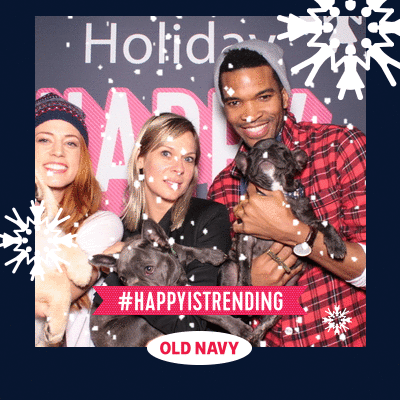 A GIF with animated snow overlay at an Old Navy branding Holiday Party at The Pacific Design Center in Los Angeles with puppies used as photo props